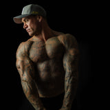 Man wearing Charcoal Chic sweat-resistant snapback cap front view – Shred Cartel Elite Series
