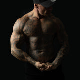 Model wearing black and pink sweat-resistant snapback cap side view – Shred Cartel Elite Series